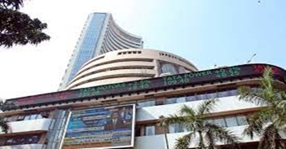 Sensex and Nifty log marginal gains to hit record highs; Rupee depreciates 20 paise against US currency